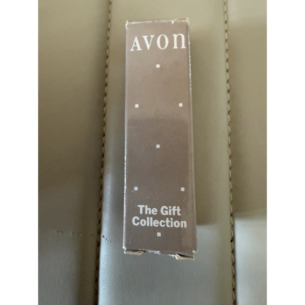AVON THE GIFT COLLECTION IN-A-TWIST MAGIC SHAVER IN BLUE